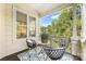 Charming balcony with a relaxing space to enjoy fresh air and neighborhood views at 921 Northeast Dr # 39, Davidson, NC 28036
