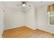 Bedroom featuring hardwood floors, ceiling fan, and window with shades at 921 Northeast Dr # 39, Davidson, NC 28036