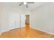 Bedroom featuring hardwood floors, and a double door closet at 921 Northeast Dr # 39, Davidson, NC 28036