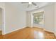 Bedroom featuring hardwood floors, ceiling fan, and a window with shades at 921 Northeast Dr # 39, Davidson, NC 28036