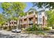 Beautiful multi-story brick condo building with manicured landscaping and a charming facade at 921 Northeast Dr # 39, Davidson, NC 28036