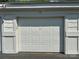 Single-car garage door with white paneling, offering secure parking and storage space at 921 Northeast Dr # 39, Davidson, NC 28036
