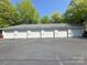 Multiple single-car garages in a row, providing ample parking and storage for residents at 921 Northeast Dr # 39, Davidson, NC 28036