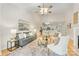 Open-concept living room with dining area, great for entertaining and everyday living at 921 Northeast Dr # 39, Davidson, NC 28036