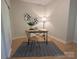 The office is functional with a stylish desk, modern lighting, and hardwood floors at 921 Northeast Dr # 39, Davidson, NC 28036