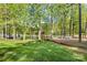 Scenic waterfront community view with lush trees, dock, and lake access at 921 Northeast Dr # 39, Davidson, NC 28036