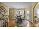 Cozy breakfast nook filled with natural light and a view of the outdoor patio area at 110 Devonshire Ln, Salisbury, NC 28146