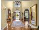 Elegant foyer with hardwood floors, a grand chandelier, and an open floor plan at 110 Devonshire Ln, Salisbury, NC 28146