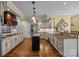 Modern kitchen featuring stainless steel appliances, granite countertops, and custom cabinetry at 110 Devonshire Ln, Salisbury, NC 28146