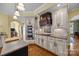 Gourmet kitchen featuring a center island, double ovens, and stainless steel appliances at 110 Devonshire Ln, Salisbury, NC 28146