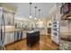 Spacious kitchen with hardwood floors, custom cabinets, and a center island at 110 Devonshire Ln, Salisbury, NC 28146