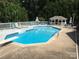 Stunning backyard pool area with diving board, gazebo, and various seating areas perfect for outdoor relaxation at 110 Devonshire Ln, Salisbury, NC 28146