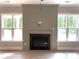 Fireplace with windows on both sides at 117 Blackbeard Ln, Mooresville, NC 28117