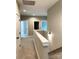 Bright hallway featuring neutral walls, carpet, white doors and trim, and modern lighting at 117 Blackbeard Ln, Mooresville, NC 28117