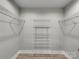 Organized walk-in closet featuring wire shelving for efficient storage solutions and easy access to belongings at 1212 Belmont Circle Dr, Lancaster, SC 29720