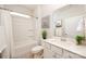 This bathroom offers a clean and modern design, featuring a shower-tub combo, a spacious vanity, and neutral tones at 153 Pampas Pl, Statesville, NC 28625
