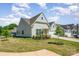 A beautiful home with a well-kept lawn and two-car garage in a Gathering-friendly neighborhood at 153 Pampas Pl, Statesville, NC 28625