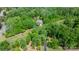 Beautiful property with a charming home surrounded by lush, mature trees offering privacy at 1590 W 7Th St, Newton, NC 28658