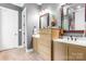 Well-lit bathroom featuring double sinks, a large mirror, and stylish neutral-toned cabinetry at 1590 W 7Th St, Newton, NC 28658
