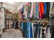 Walk-in closet filled with plenty of organized clothing racks and storage space at 1590 W 7Th St, Newton, NC 28658