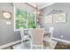 Bright dining area with large window offering pleasant outdoor views and elegant decor at 1590 W 7Th St, Newton, NC 28658