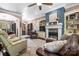 Inviting living room features built-in shelving, a fireplace, and multiple seating arrangements at 1590 W 7Th St, Newton, NC 28658