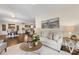 Open floorplan living room with hardwood floors, neutral decor and lots of natural light at 1716 Wickford Pl, Charlotte, NC 28203