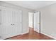 Bedroom featuring closet and doorway at 1807 Sugar Hollow Dr, Charlotte, NC 28214