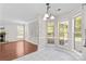 Bright breakfast nook with views of the living room, complete with a fireplace at 1807 Sugar Hollow Dr, Charlotte, NC 28214