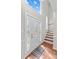 Elegant foyer with decorative door and staircase at 1807 Sugar Hollow Dr, Charlotte, NC 28214
