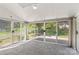Bright sunroom with lots of windows overlooking the backyard at 1807 Sugar Hollow Dr, Charlotte, NC 28214