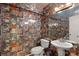 Unique bathroom with vintage wallpaper, a toilet, and a pedestal sink with modern fixtures at 1816 5Th Nw St, Hickory, NC 28601
