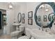 Charming half bathroom featuring pedestal sink, decorative mirror and sconce lighting at 1816 5Th Nw St, Hickory, NC 28601
