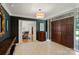 Grand foyer featuring double doors, decorative wallpaper, and elegant decor at 1816 5Th Nw St, Hickory, NC 28601