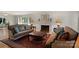 Inviting living room features fireplace, hardwood floors and ample natural light at 1816 5Th Nw St, Hickory, NC 28601