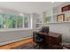 Bright office space with a large desk, built-in shelving, and plenty of natural light at 1816 5Th Nw St, Hickory, NC 28601