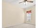 Bedroom featuring carpeted floors, a ceiling fan, and natural light from a window at 20135 Dovekie Ln, Fort Mill, SC 29707