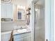 Bathroom featuring a glass-enclosed shower, vanity with sink, and overhead lighting at 212 Brookwood Dr, Salisbury, NC 28146