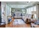 Cozy living room with hardwood floors, comfortable seating, and abundant natural light at 212 Brookwood Dr, Salisbury, NC 28146