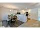 Cozy dining area adjacent to kitchen with hardwood floors at 2141 Talbert Ct, Charlotte, NC 28214