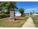 Well manicured stone sign for Paw Creek Village neighborhood on a sunny day at 2141 Talbert Ct, Charlotte, NC 28214
