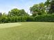 Expansive and meticulously maintained backyard with lush green lawn at 2343 Vernon Dr, Charlotte, NC 28211