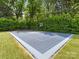 Private basketball and volleyball court surrounded by lush landscaping at 2343 Vernon Dr, Charlotte, NC 28211