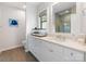 Modern bathroom with sleek vanity, a large mirror, and glass-enclosed shower at 2343 Vernon Dr, Charlotte, NC 28211