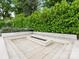 Outdoor fire pit area with built-in seating perfect for cozy evenings at 2343 Vernon Dr, Charlotte, NC 28211