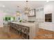 Spacious kitchen with a large island, pendant lighting, and modern appliances for culinary excellence at 2343 Vernon Dr, Charlotte, NC 28211