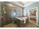 Bathroom with garden tub and glass enclosed shower featuring tiled walls with bedroom view at 2355 Crockett Park Pl, Charlotte, NC 28203