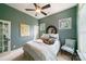 Bedroom with beautiful view, fan, and windows allowing for natural light at 2355 Crockett Park Pl, Charlotte, NC 28203