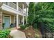 Charming front yard with manicured landscaping, walkway, and a welcoming entrance to the home at 2355 Crockett Park Pl, Charlotte, NC 28203