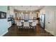 Elegant kitchen with island, stainless steel appliances, pendant lighting, and white cabinetry at 2355 Crockett Park Pl, Charlotte, NC 28203